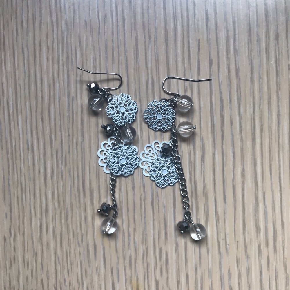 White flowery earrings